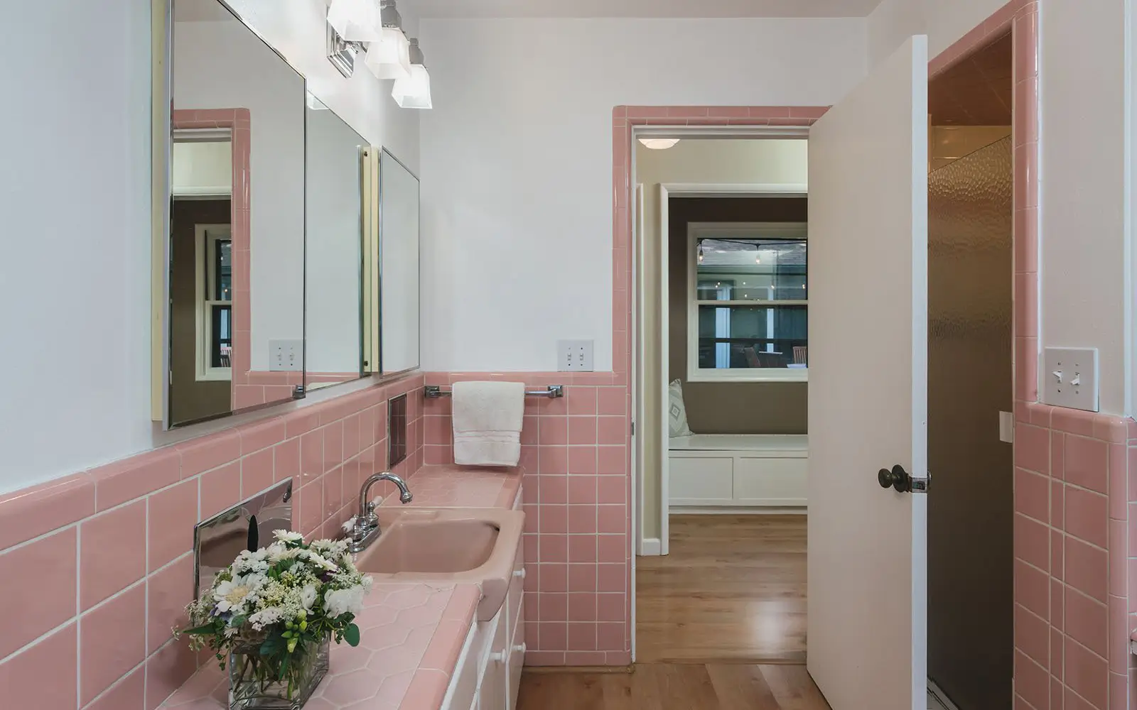 Hemlock bath vanity before: cramped pink galley with a single sink
