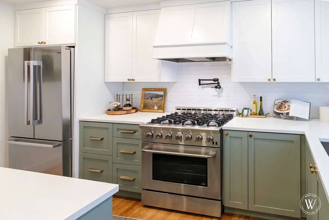 Sherwood range wall after: a professional gas range, custom white hood, pot filler and subway-tile backsplash