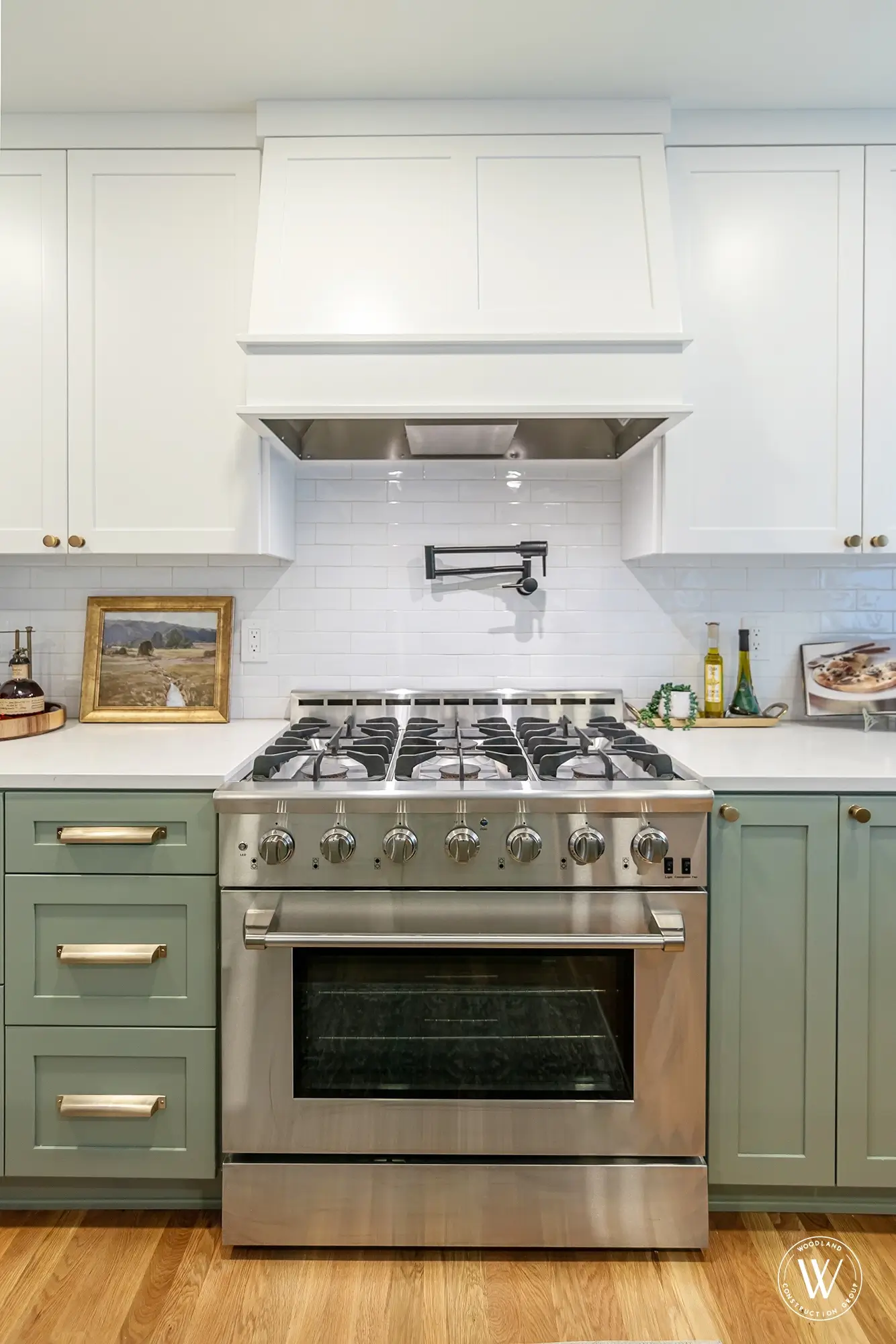 Murray kitchen corner cabinet with a swing-out shelf holding small appliances beside the range