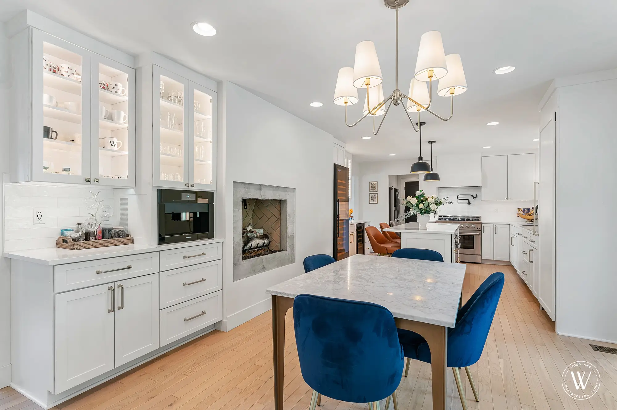 Berkshire kitchen coffee station with built-in Miele machine, marble breakfast table and blue velvet chairs